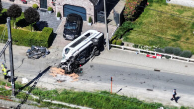 Scene where school bus was struck by train at a level crossing in Belgium